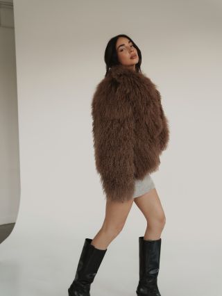 Wrapped in Mongolian shearling by Fine Furs ✨ Softness. Volume. Statement.